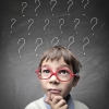 Child with glasses and question mark logo