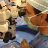 Dr. Stephen Hamilton works on patient