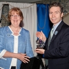 Dr. Roach with award