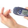 Person checking blood glucose level
