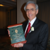 Dr. Pollard with award