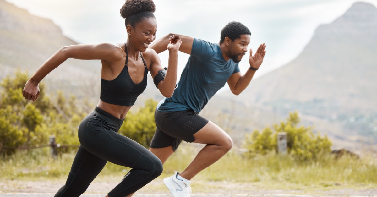 Athletic woman and man running