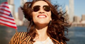 woman with sunglasses on smiling