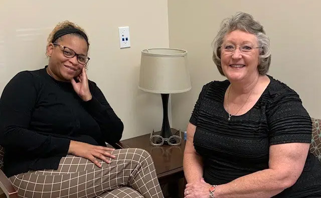 Two patient account representatives at ECA