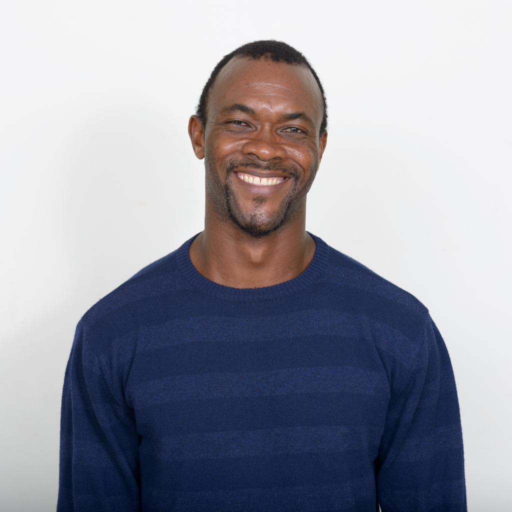 Studio shot of African man smiling