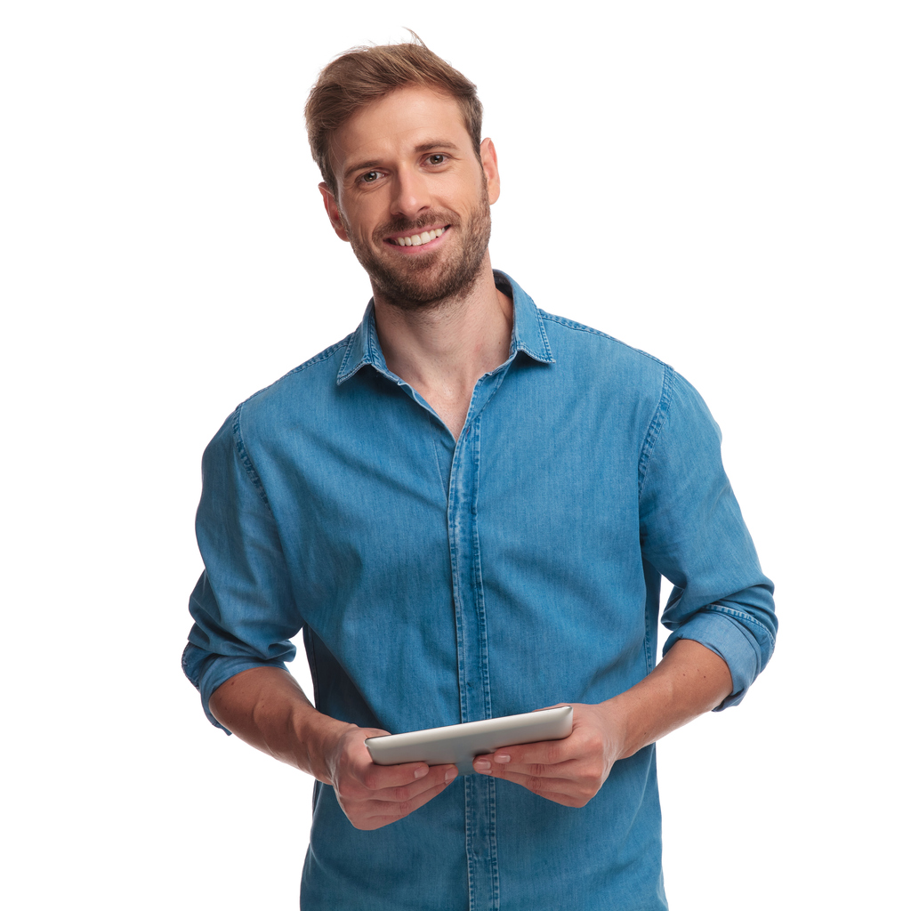 smiling young casual man holding a tablet