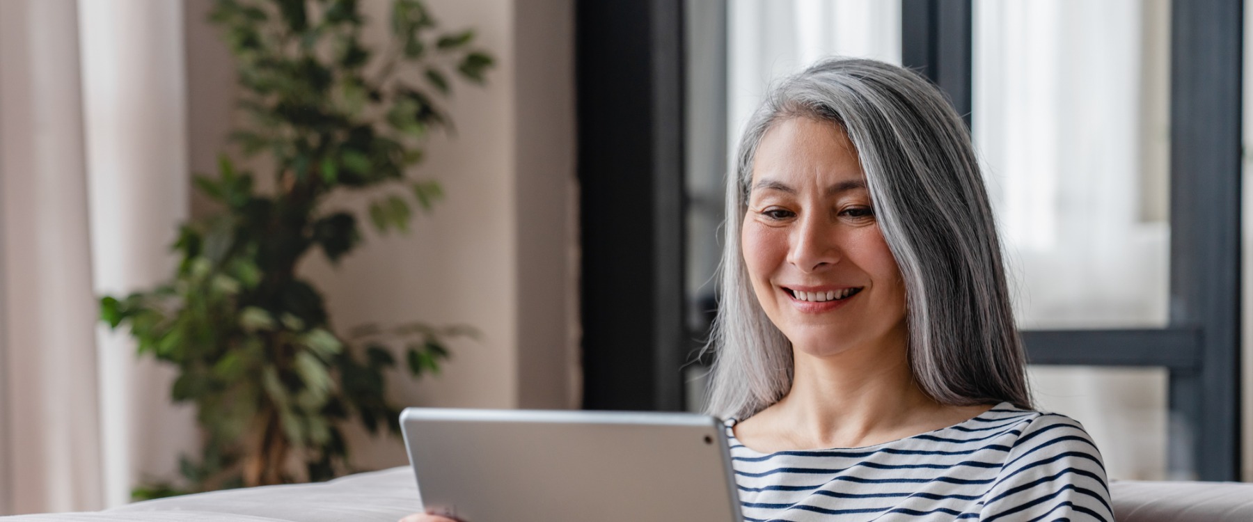 Relaxed laughing middle aged mother