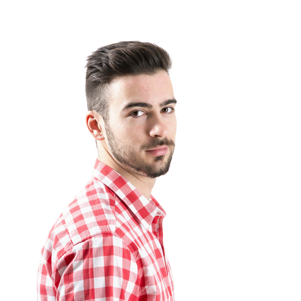 Portrait of bearded man looking at camera isolated over white background